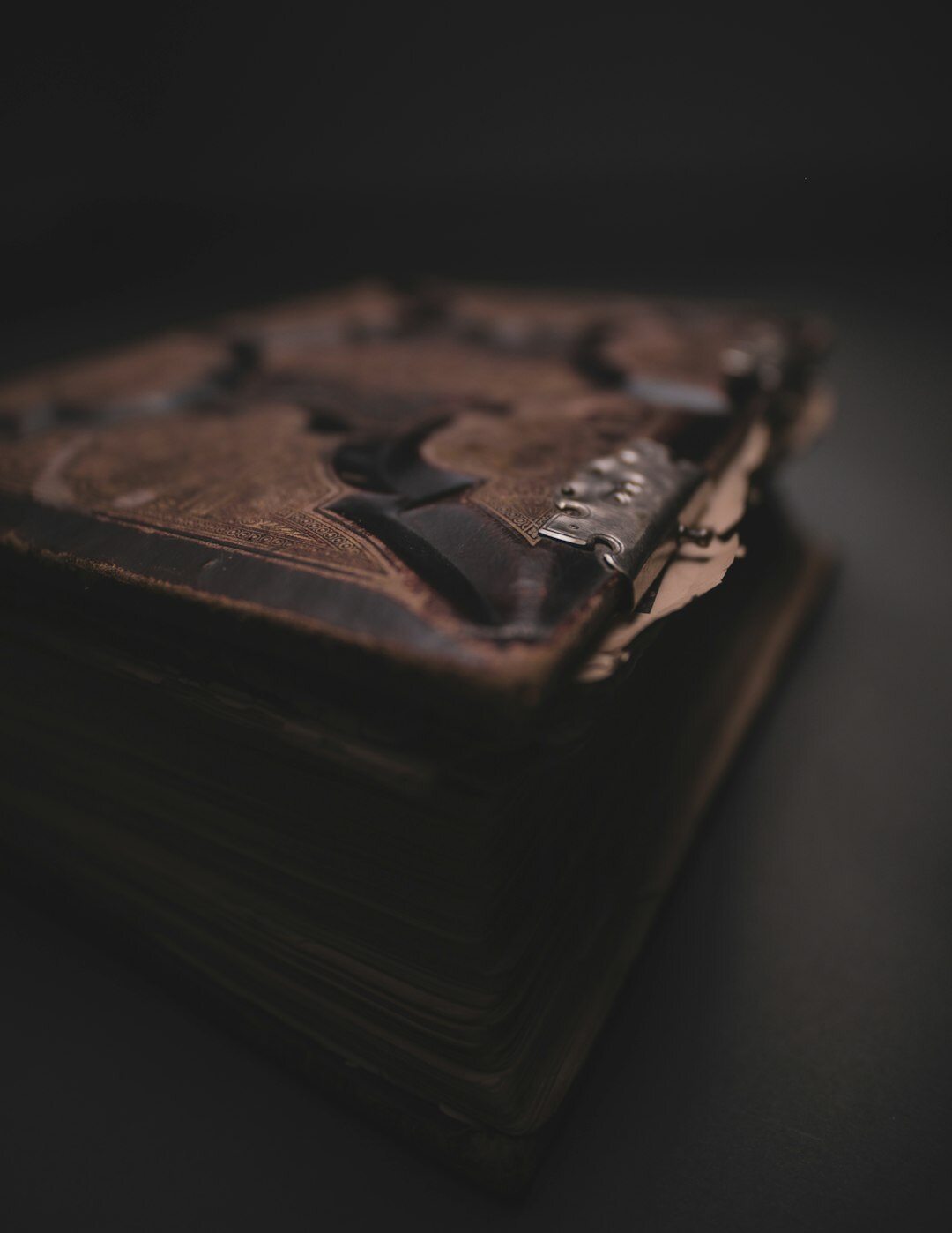 mysterious book cover with shadows