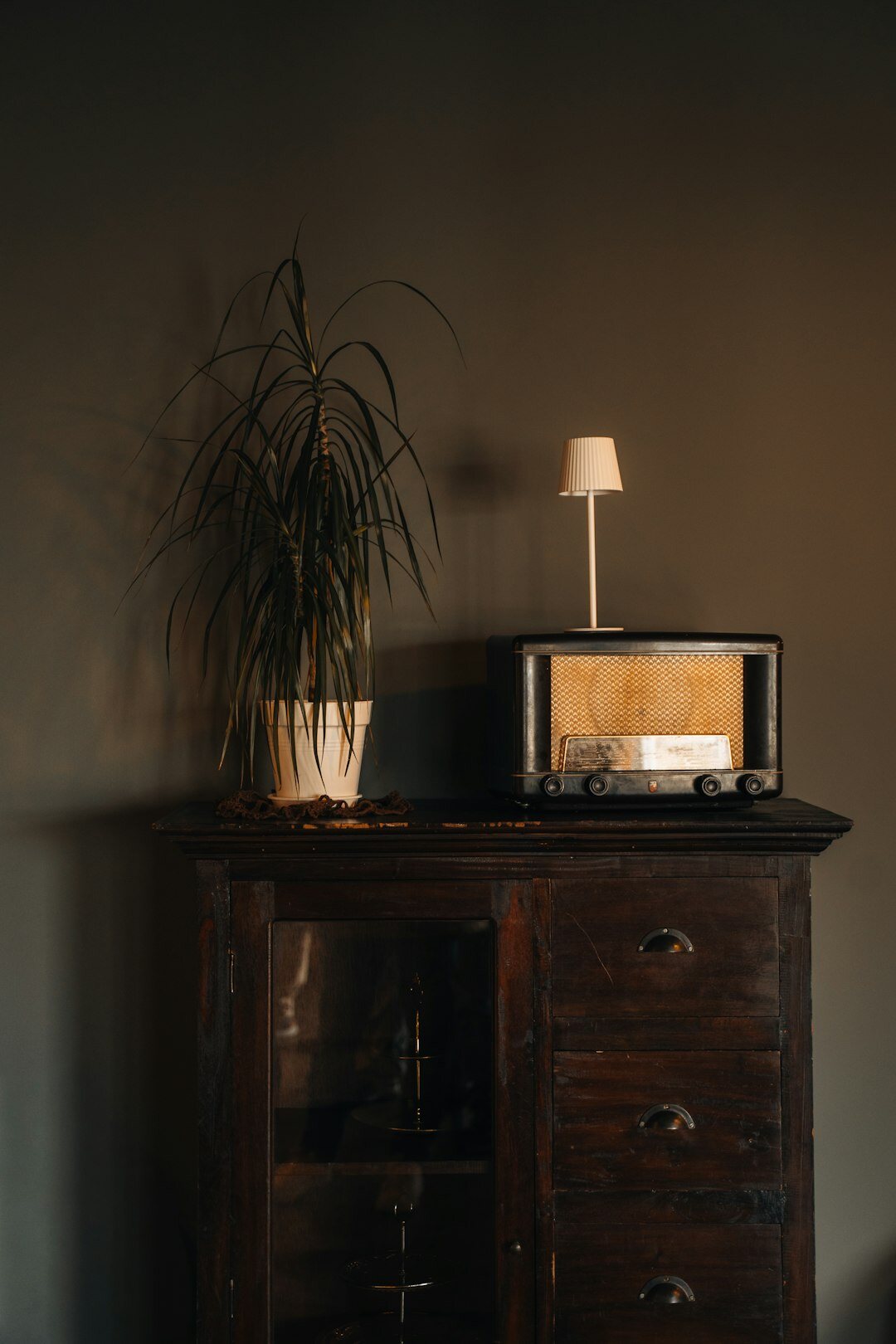 old clock ticking in dark room